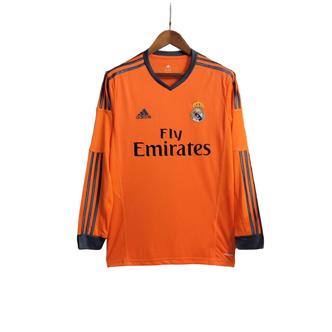 Camiseta retro de manga larga naranja de la tercera equipación del Real Madrid 2013/2014